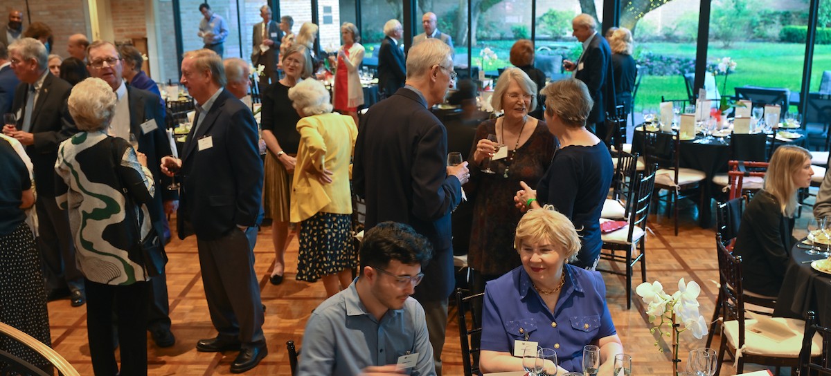 Guests at the annual meeting in the Cohen House