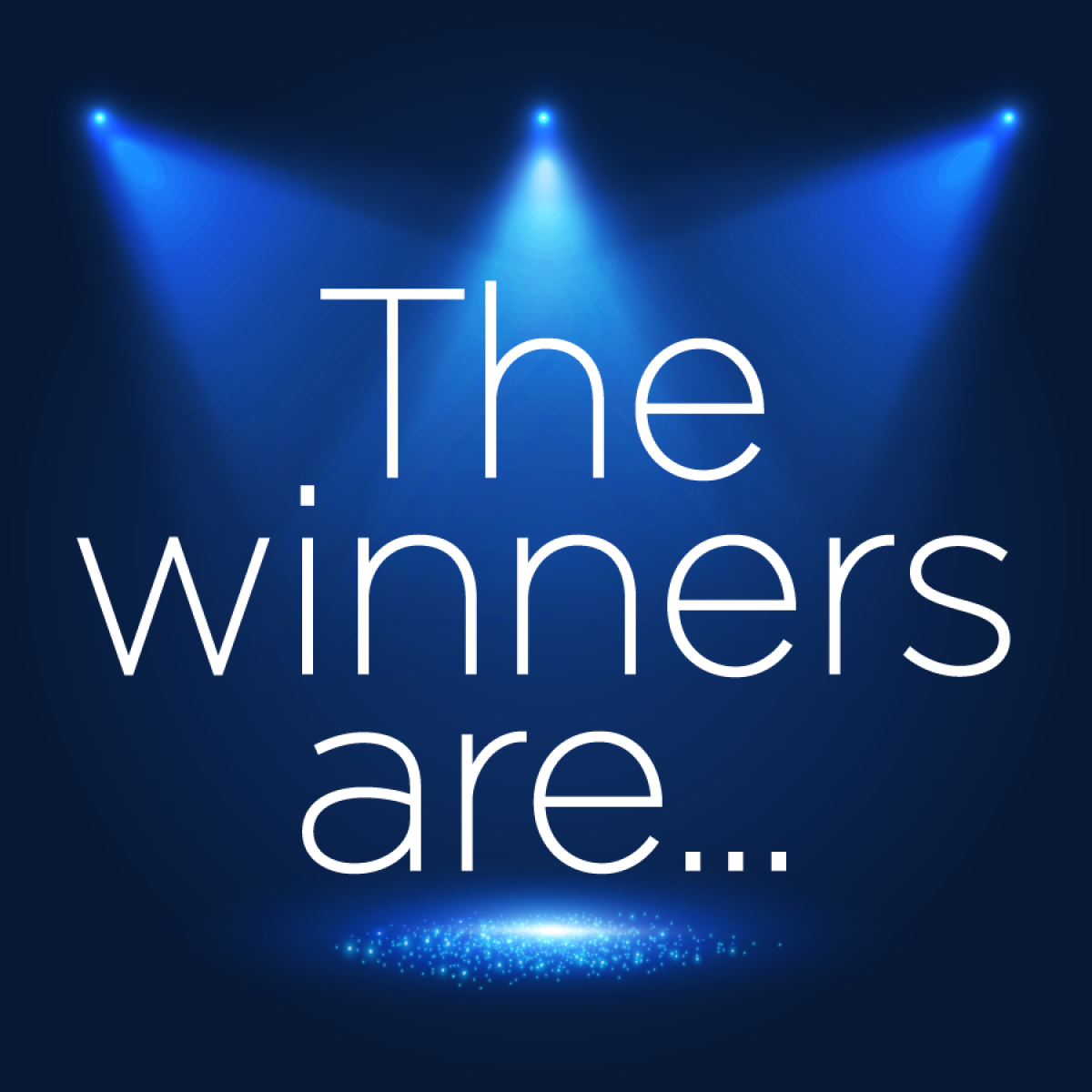 Spotlights on a stage with the words, "The winners are..."