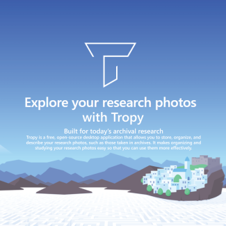 Tropy logo with an image of a photographer filming a mountain village