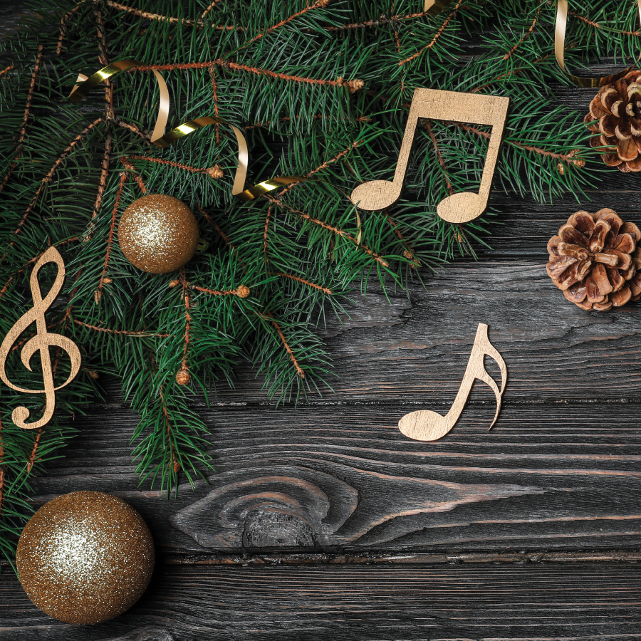 pine needles with musical notes, ornaments and pinecones